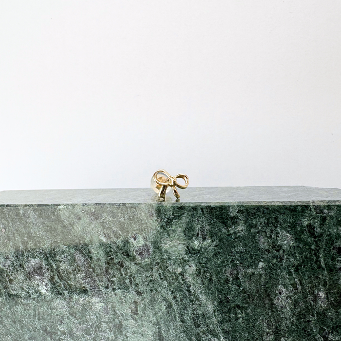 E0047 || Bow Stud II